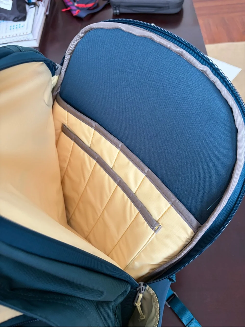 Baboon to the moon city backpack in teal with yellow